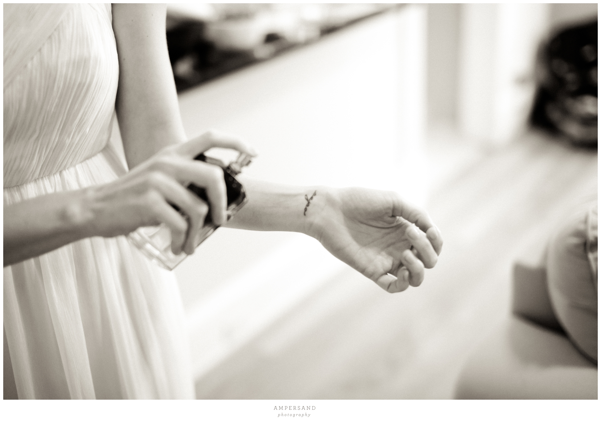 Bride getting ready in her Capitol Hill apartment // Photos by Ampersand Photography