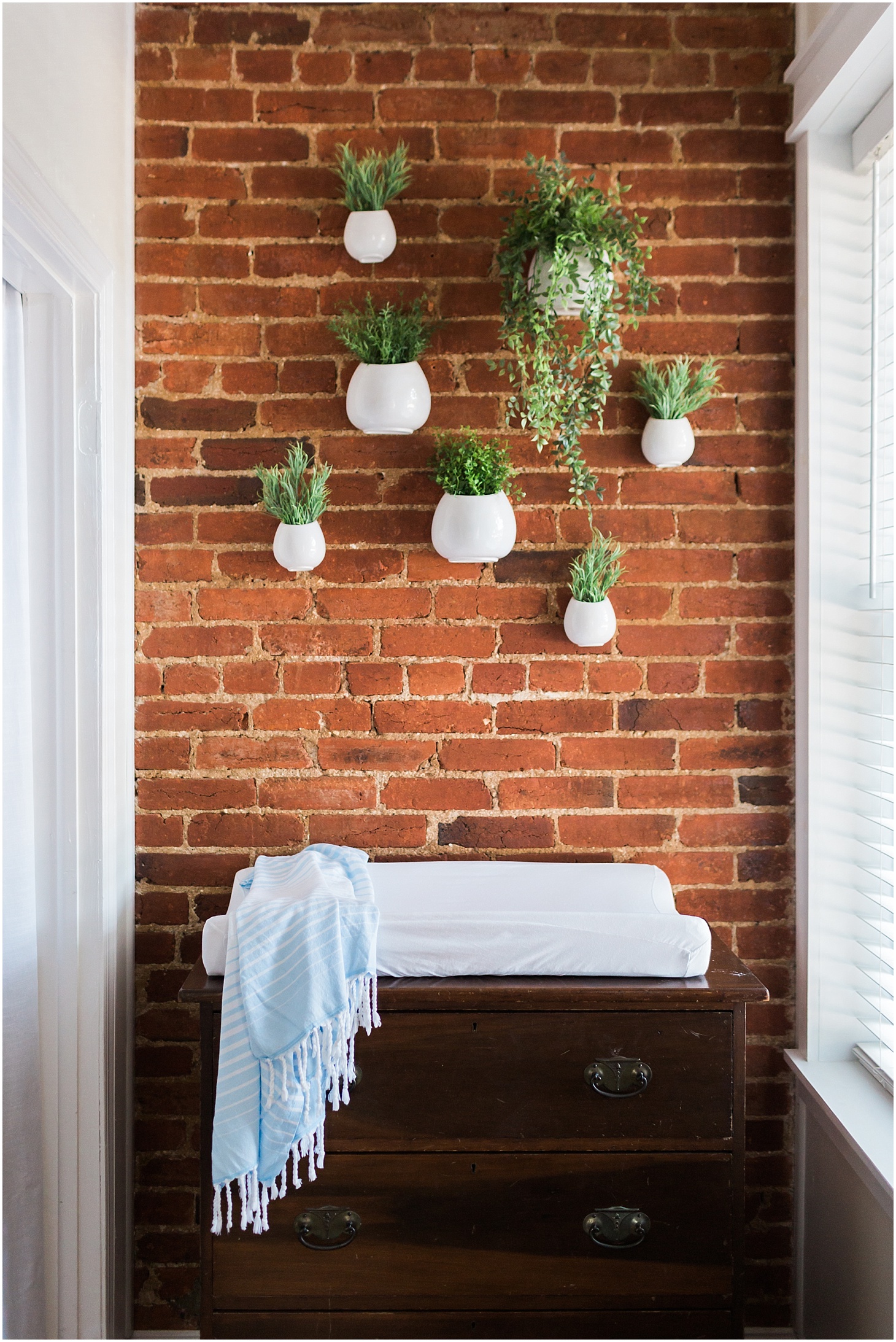 Succulent Wall In Nursery | Modern Nursery Decor Inspiration | Exposed Brick Nursery Tour | Sarah Bradshaw Photography | Washington, DC Interior Design Photographer
