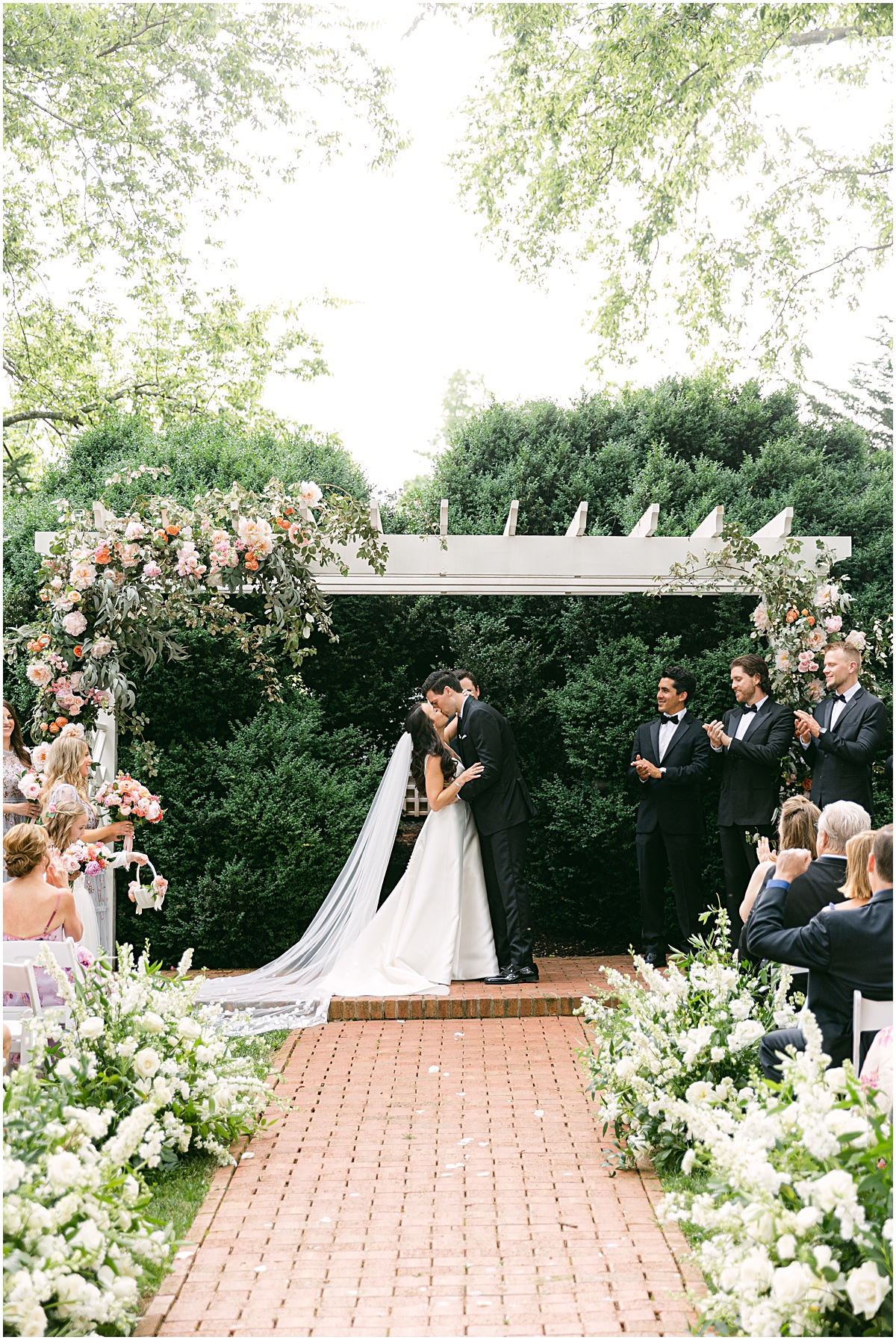 First kiss. Joyful summer wedding at the Inn at Willow Grove by Sarah Bradshaw. Planning by Kelley Cannon Events.