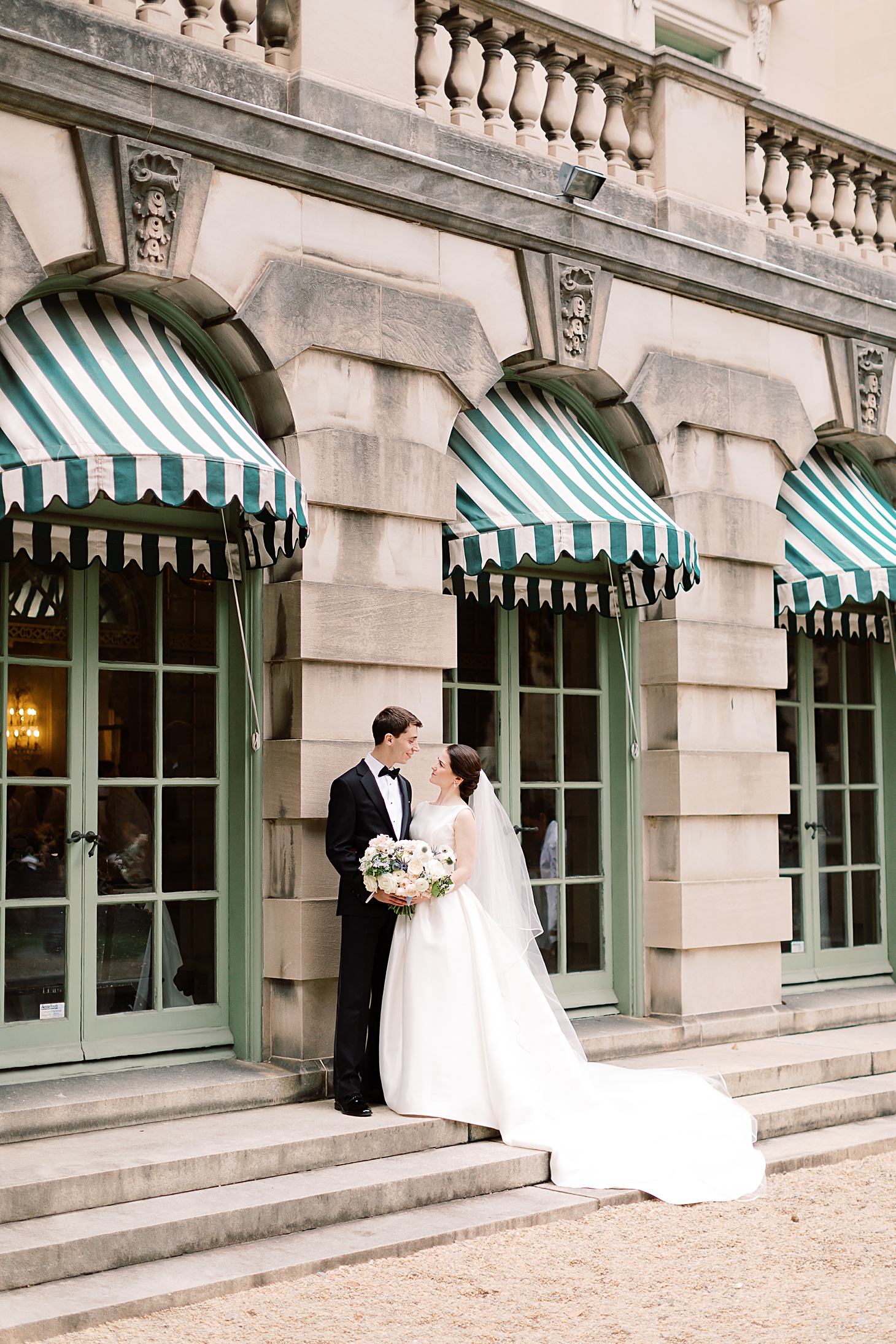 Green striped awning at Anderson House Wedding by Sarah Bradshaw