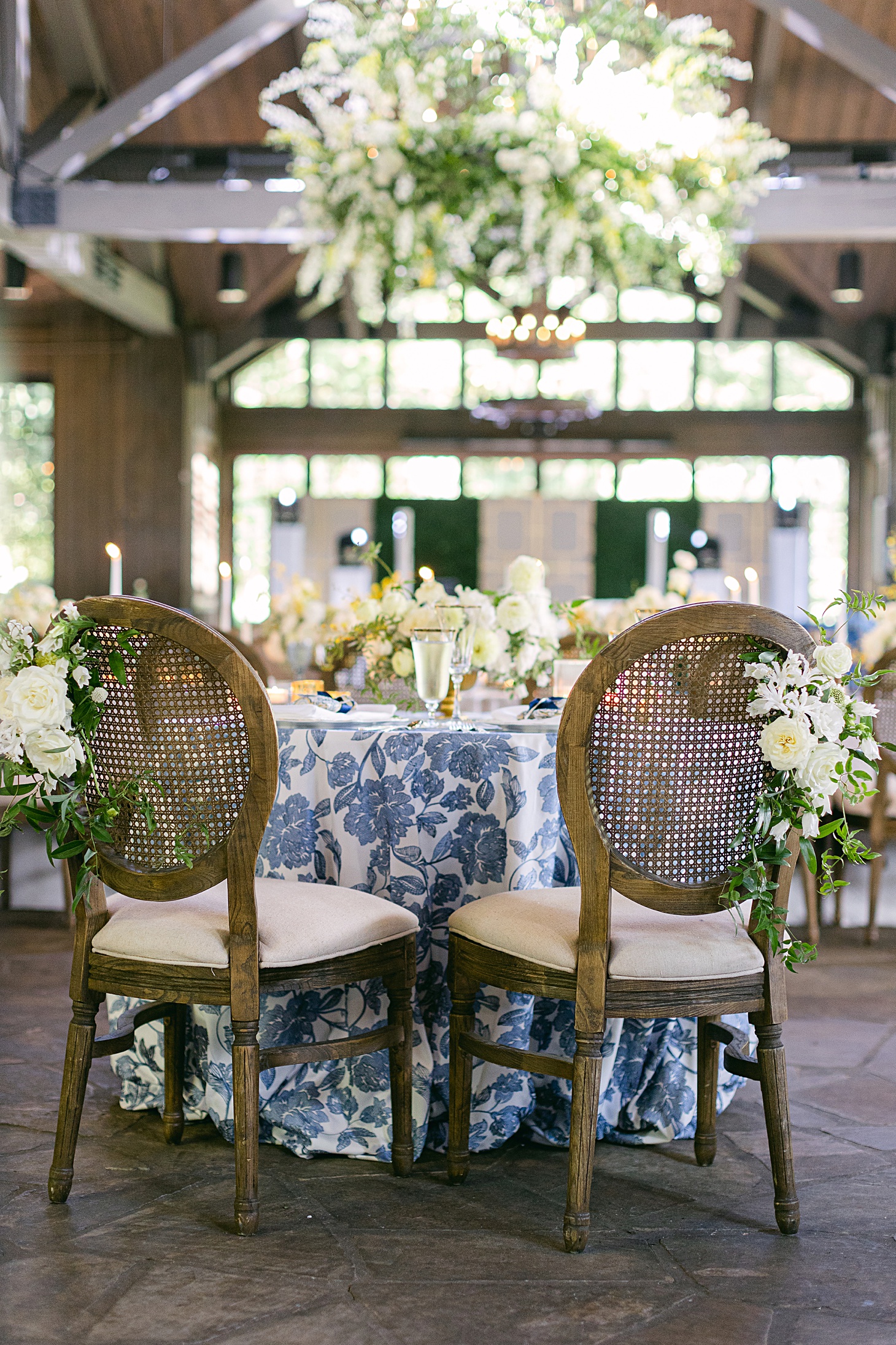 Blue and white sweatheart table  at The Farm at Old Edwards Inn wedding by Sarah Bradshaw Photography