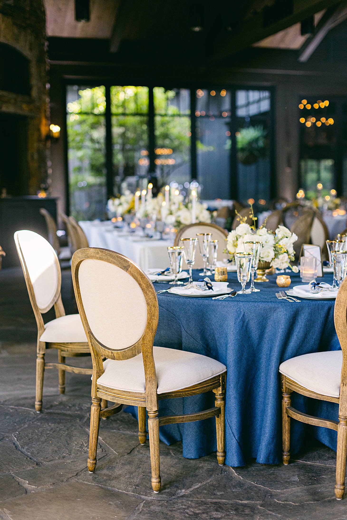 Blue and white reception design by Beckon Events  at The Farm at Old Edwards Inn wedding by Sarah Bradshaw Photography