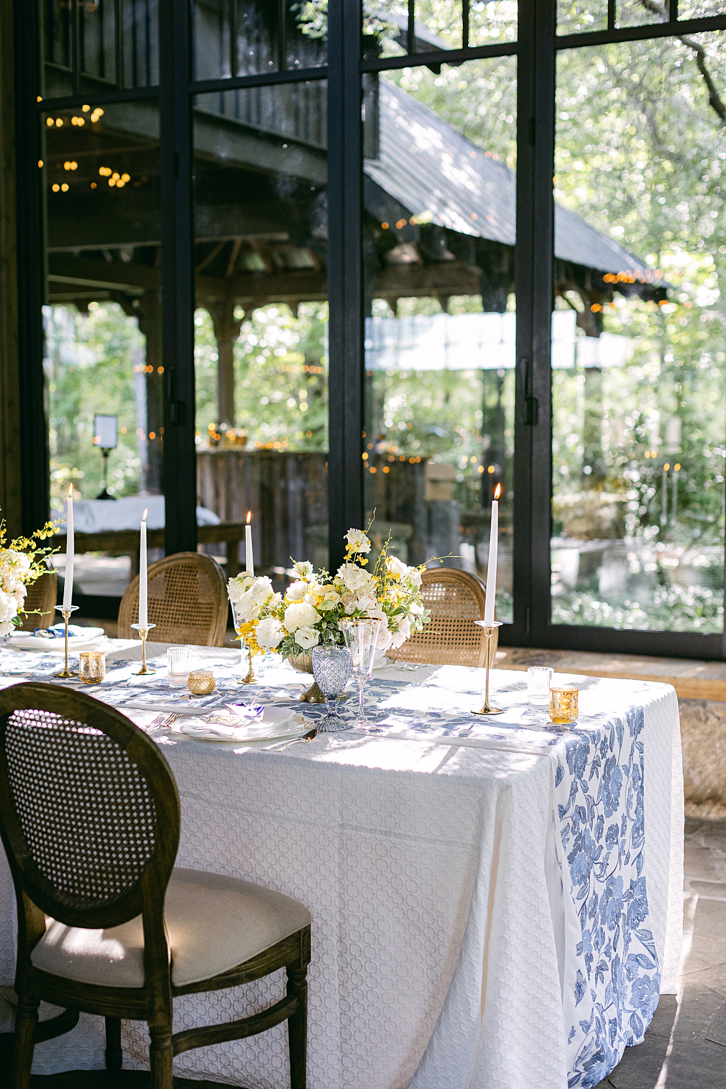 Custom blue and white table runner  at The Farm at Old Edwards Inn wedding by Sarah Bradshaw Photography