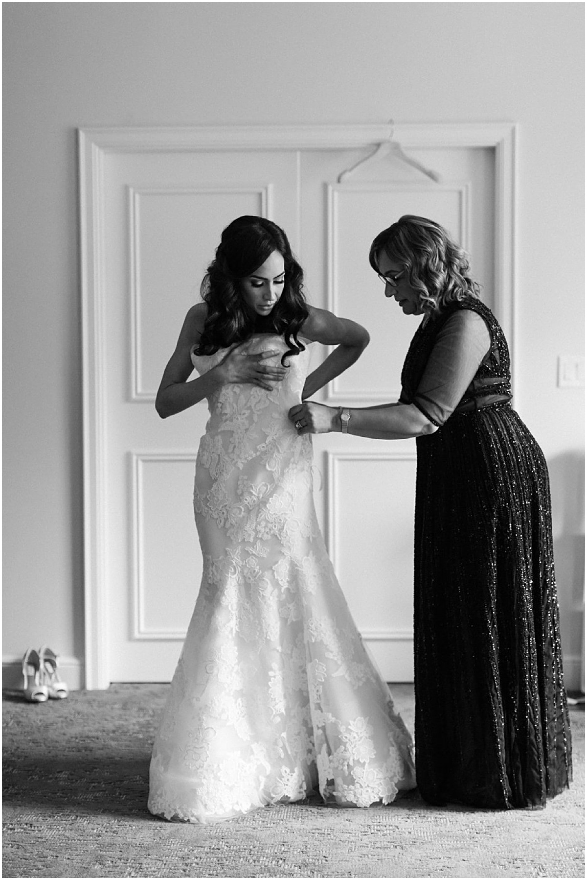 Bride getting dressed at Four Seasons Washington |  | The 10 Best DC Hotels for  Getting Ready on Your Wedding Day