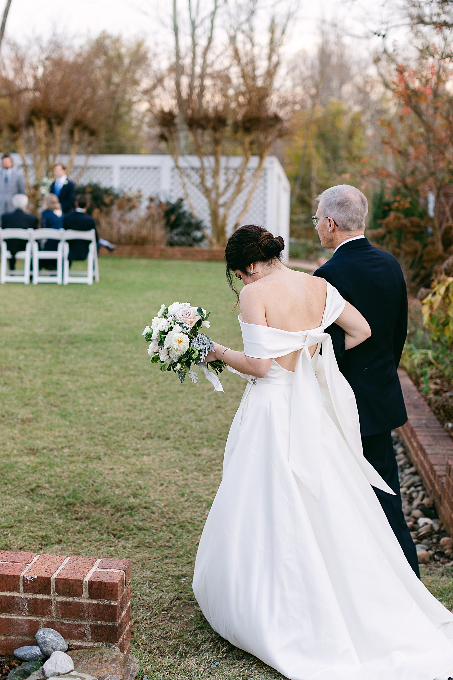 Outdoor ceremony at wedding at The Clifton Charlottesville by Sarah Bradshaw Photography