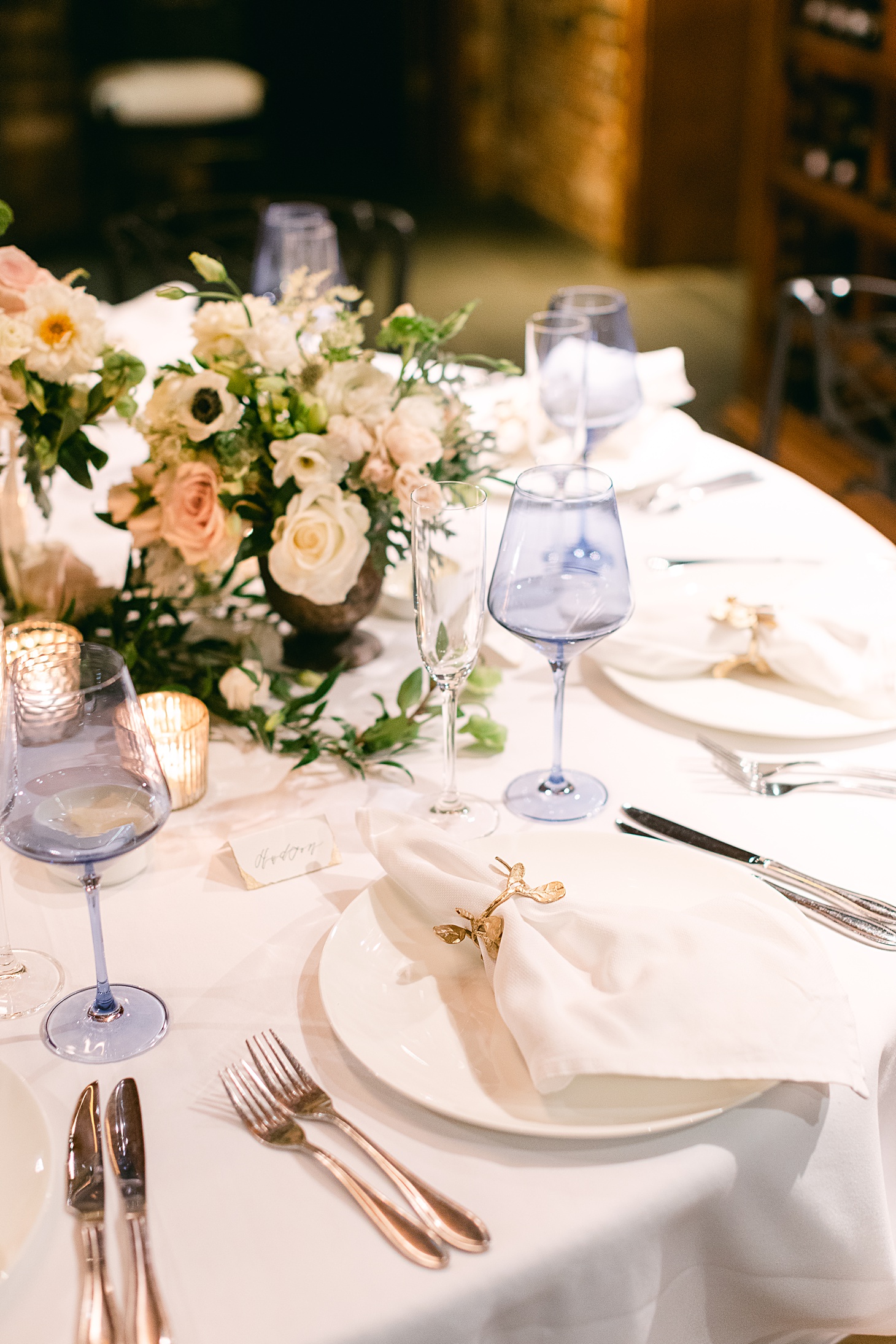 Dinner setting in wine cellar at wedding at The Clifton Charlottesville by Sarah Bradshaw Photography