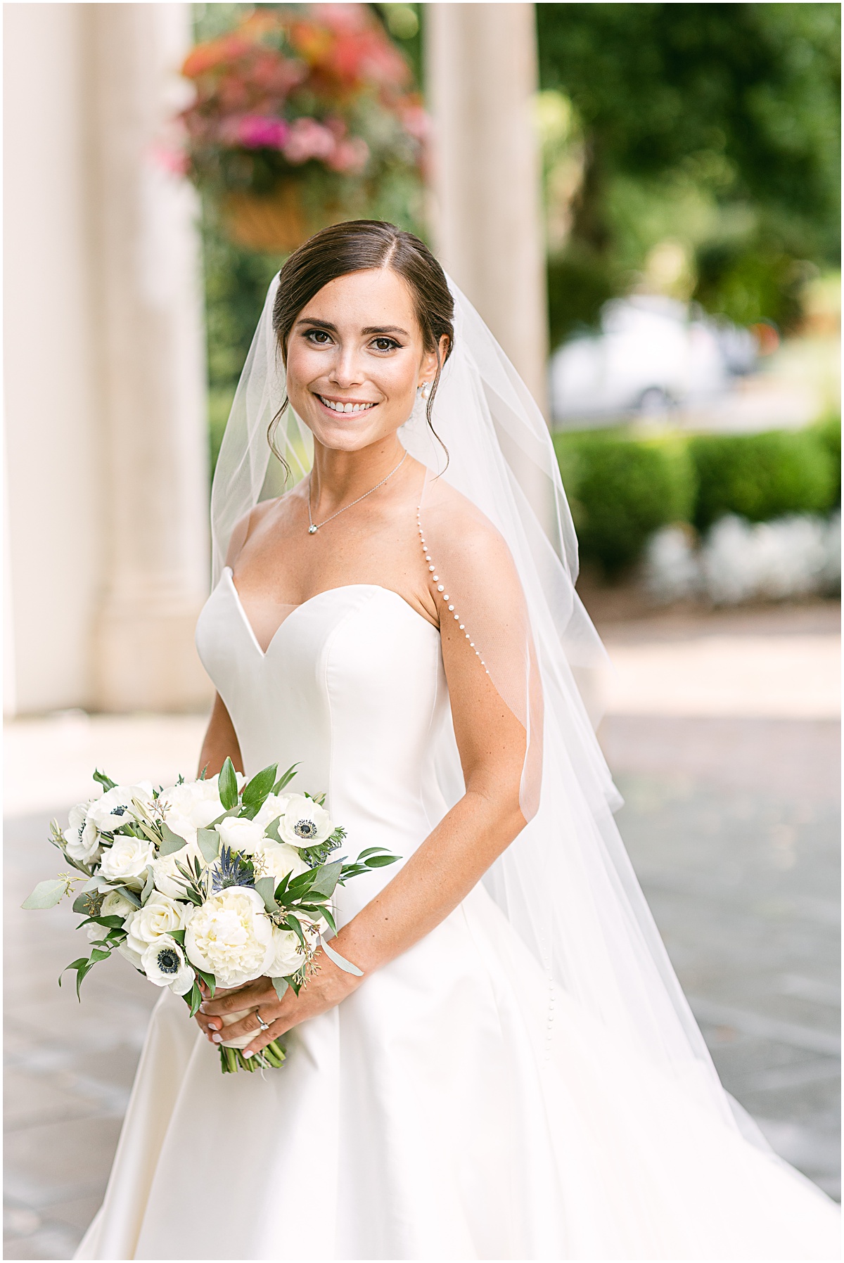 Smiling bride  at Congressional Country Club wedding by Sarah Bradshaw
