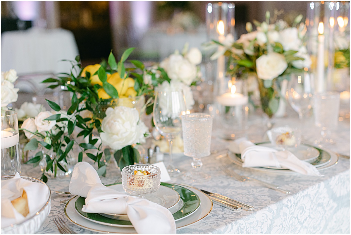 Green and yellow head table at lemon-themed wedding at Congressional Country Club by Sarah Bradshaw