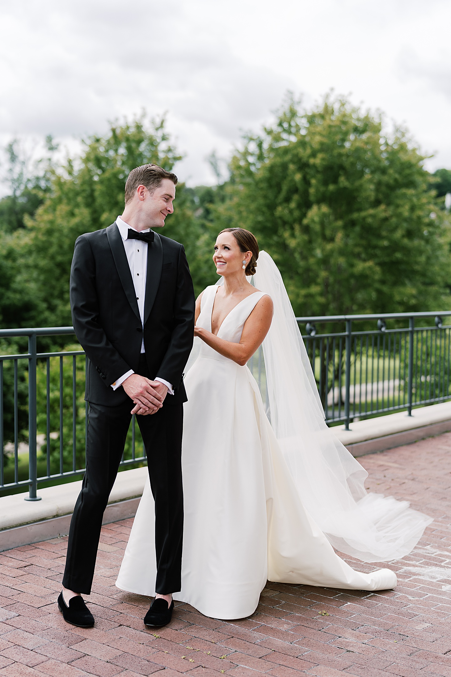 Joyful first look  | Traditional Family Wedding at Belle Haven Country Club in Alexandria by Sarah Bradshaw