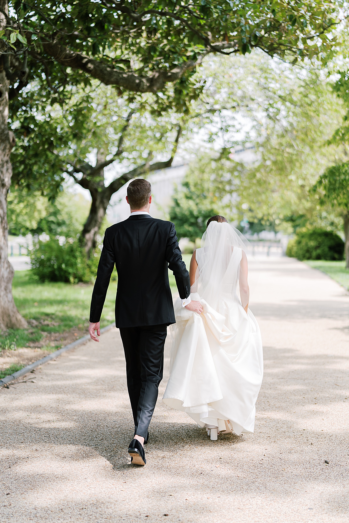 Walking couple  | Traditional Family Wedding at Belle Haven Country Club in Alexandria by Sarah Bradshaw