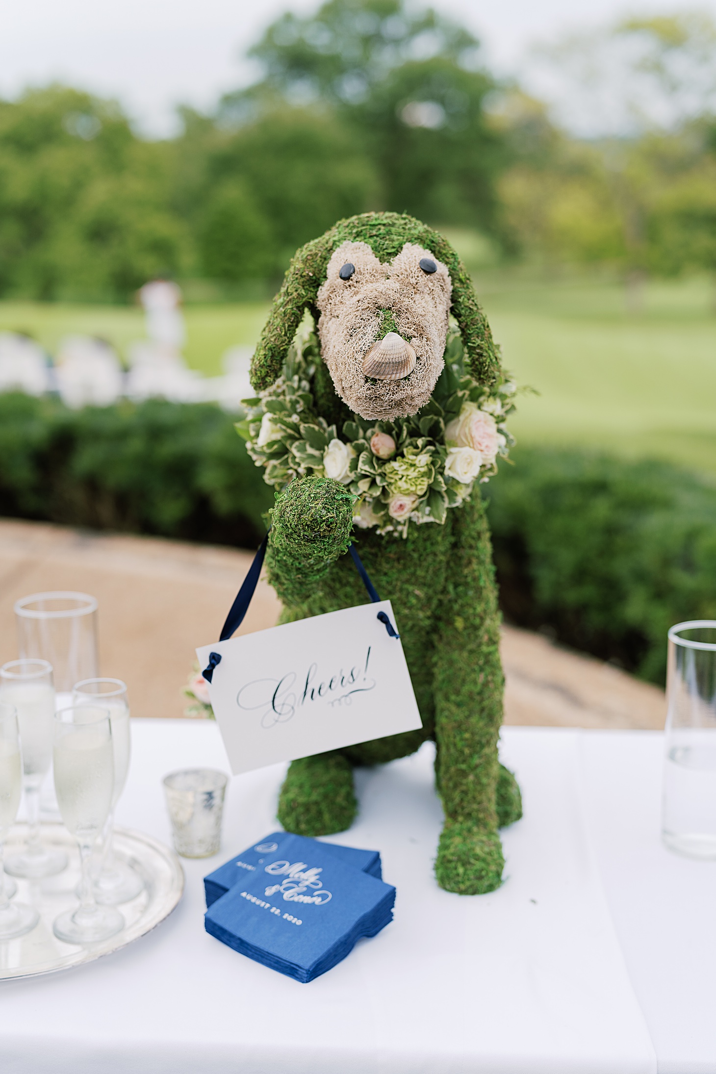 Custom moss puppy for cocktail hour  | Traditional Family Wedding at Belle Haven Country Club in Alexandria by Sarah Bradshaw