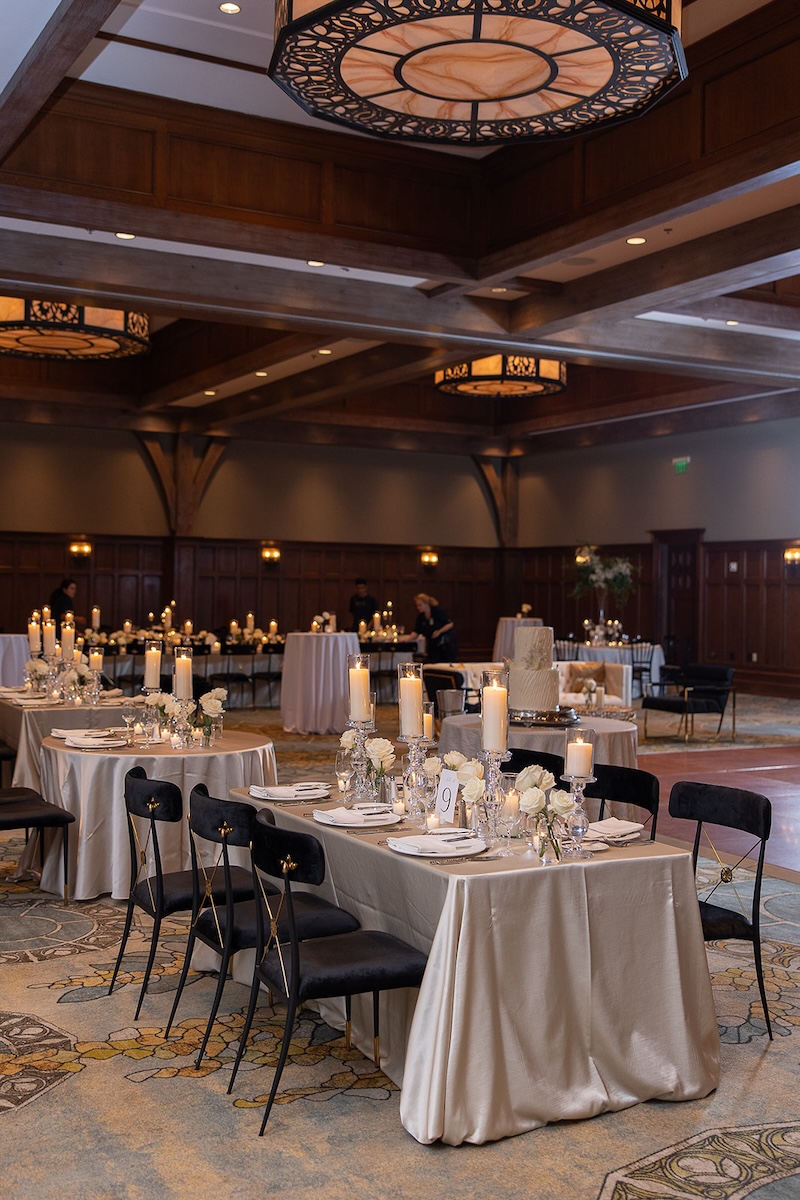 Simple and elegant ballroom wedding reception design. Gold, black & white decor, simple centerpieces. Elegant wedding at the Ritz-Carlton Lake Oconee in Georgia. Sarah Bradshaw Photography.