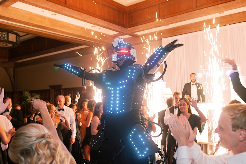 Wedding reception surprise for guests, dancing robot. Elegant wedding at the Ritz-Carlton Lake Oconee in Georgia. Sarah Bradshaw Photography.