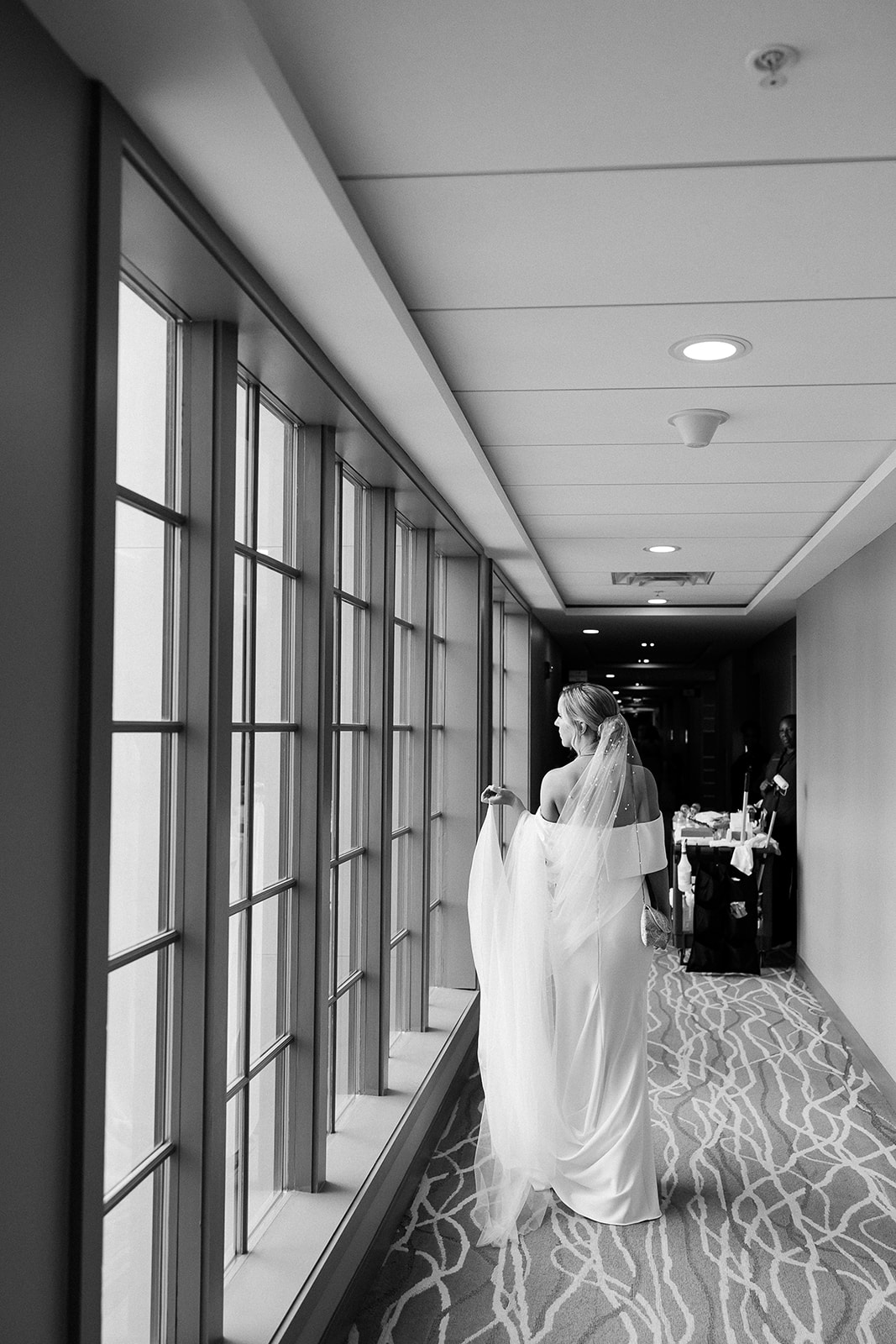 Bride in modern wedding dress and long veil. high end elopement wedding in tampa florida. sarah bradshaw photography.