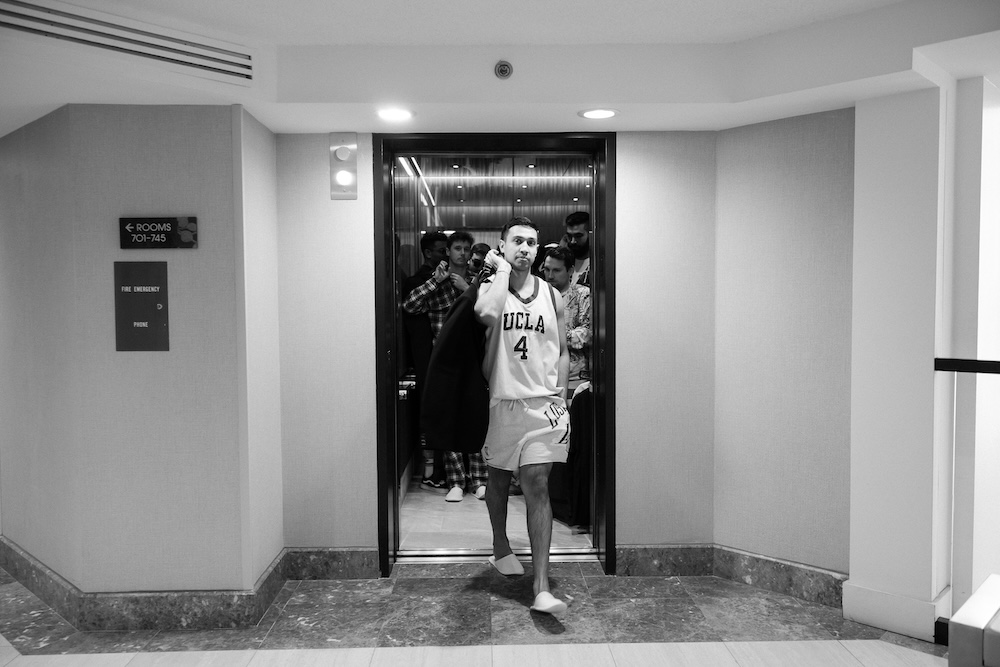 Groom and groomsmen exit elevator on wedding morning. Modern Washington DC wedding at National Museum of Women in the Arts. Sarah Bradshaw Photography.