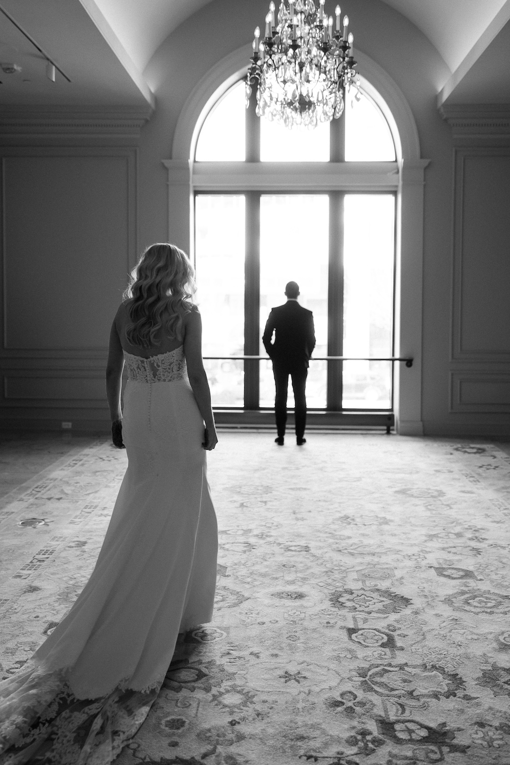 Bride walking up to groom for first look reveal. Modern Washington DC wedding at National Museum of Women in the Arts. Sarah Bradshaw Photography.