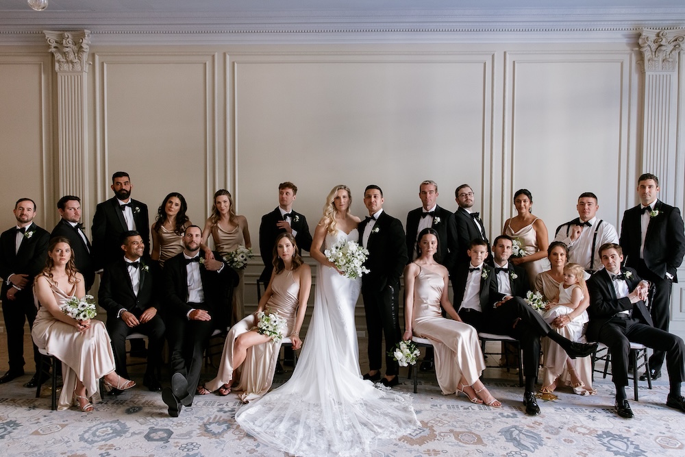 Posed portrait of wedding party. Modern Washington DC wedding at National Museum of Women in the Arts. Sarah Bradshaw Photography.