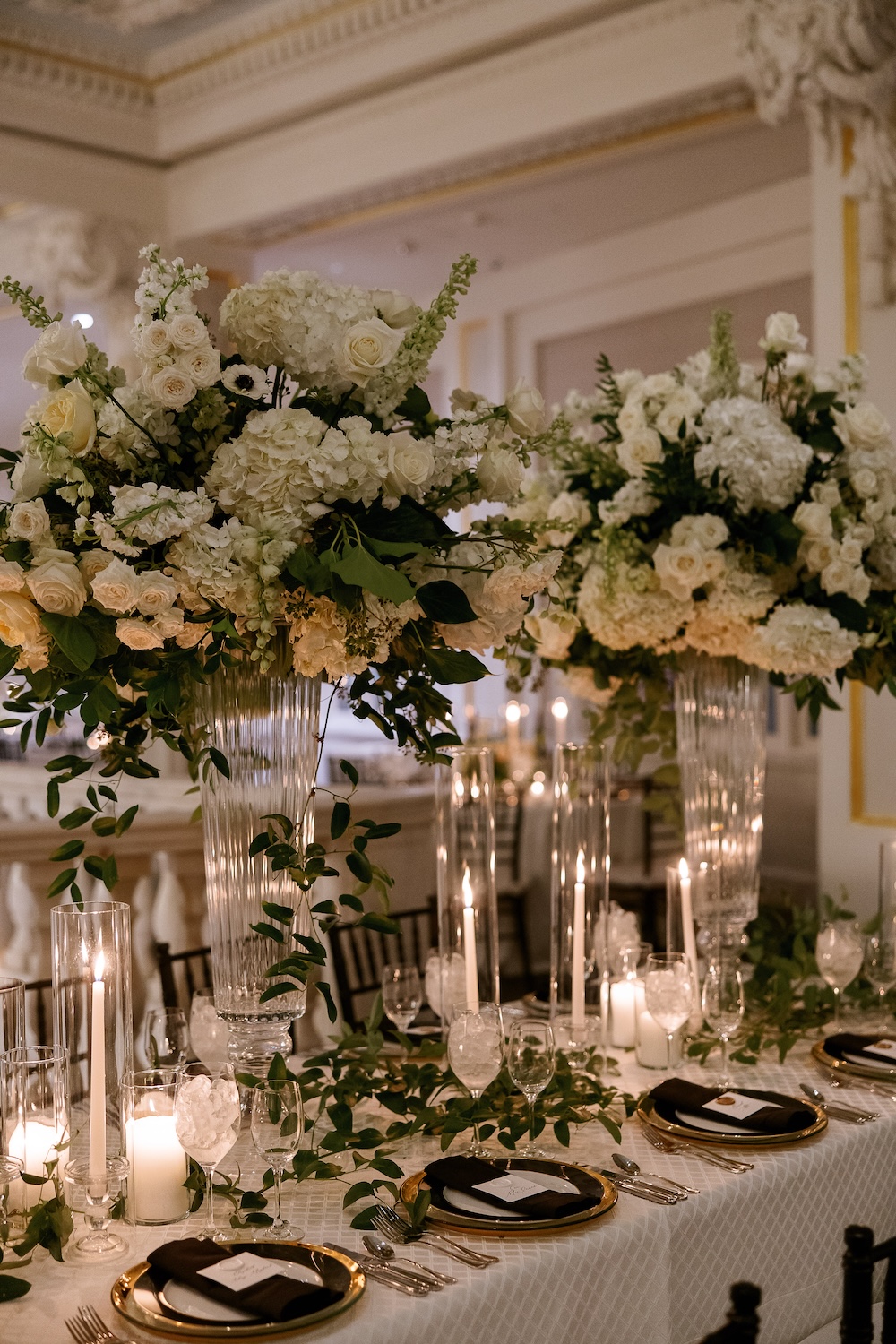 Modern wedding reception decor. tall floral centerpieces. Modern Washington DC wedding at National Museum of Women in the Arts. Sarah Bradshaw Photography.