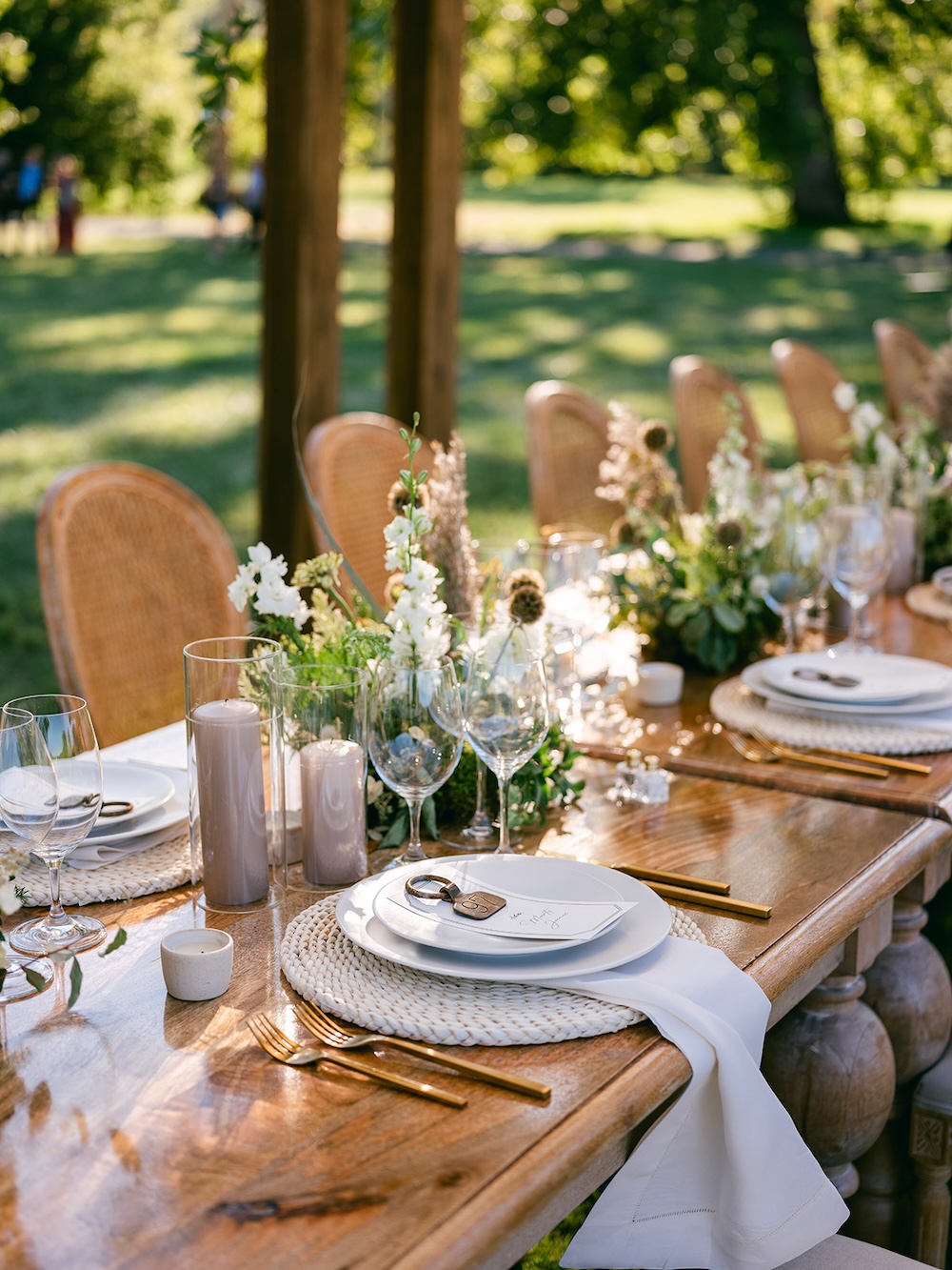 Boho chic tablescape, neutral tones place setting. Milestone birthday party celebration weekend in Middleburg, Virginia. Sarah Bradshaw Photography.