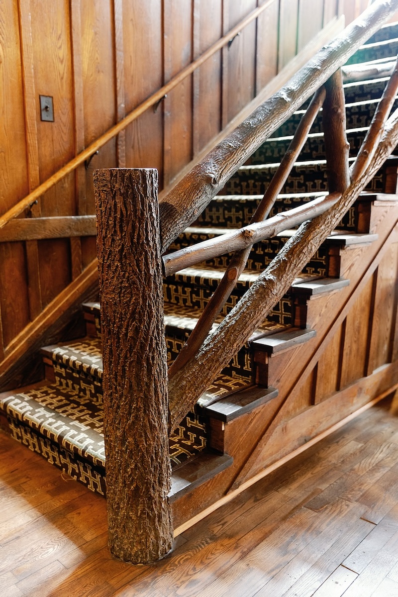 Unique wood timber staircase in mountain lodge. High Hampton in North Carolina, Sarah Bradshaw Photography