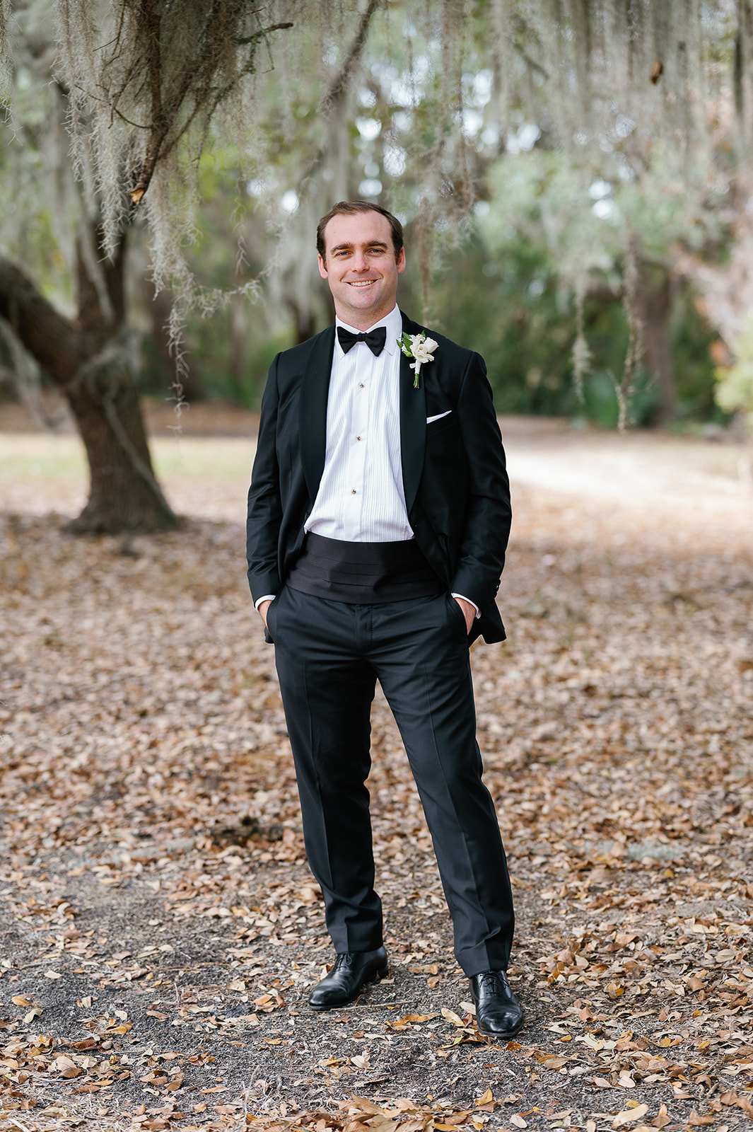 Groom in tuxedo, traditional wedding day portrait. Classic Black Tie wedding in Georgetown, SC. Sarah Bradshaw Photography