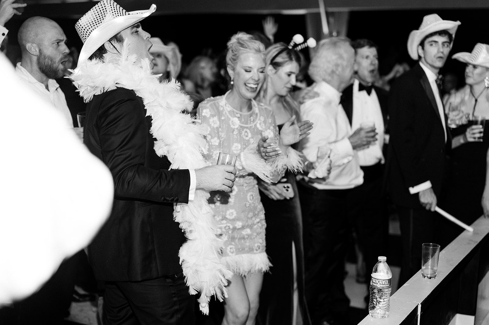 wedding reception dancing, bride in short reception dress. Classic Black Tie wedding in Georgetown, SC. Sarah Bradshaw Photography