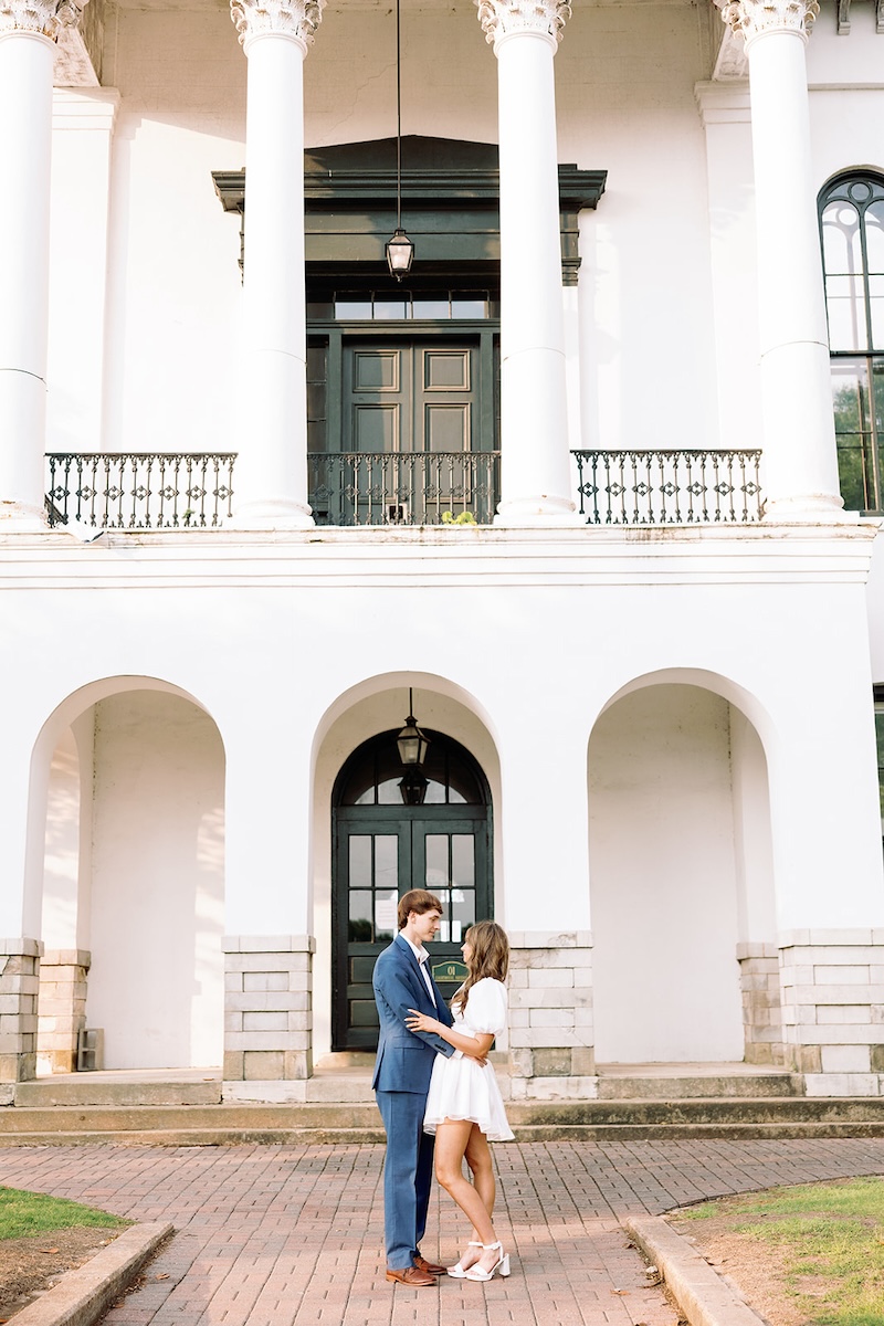 Classic portrait posing. chic little white dress with pouf sleeves. southern wedding engagement session, sarah bradshaw photography.