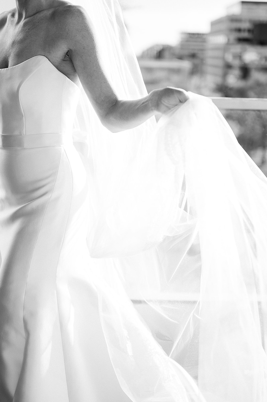 detail photo of bride's veil blowing. Timeless winter wedding, anderson house, washington dc, sarah bradshaw photography.