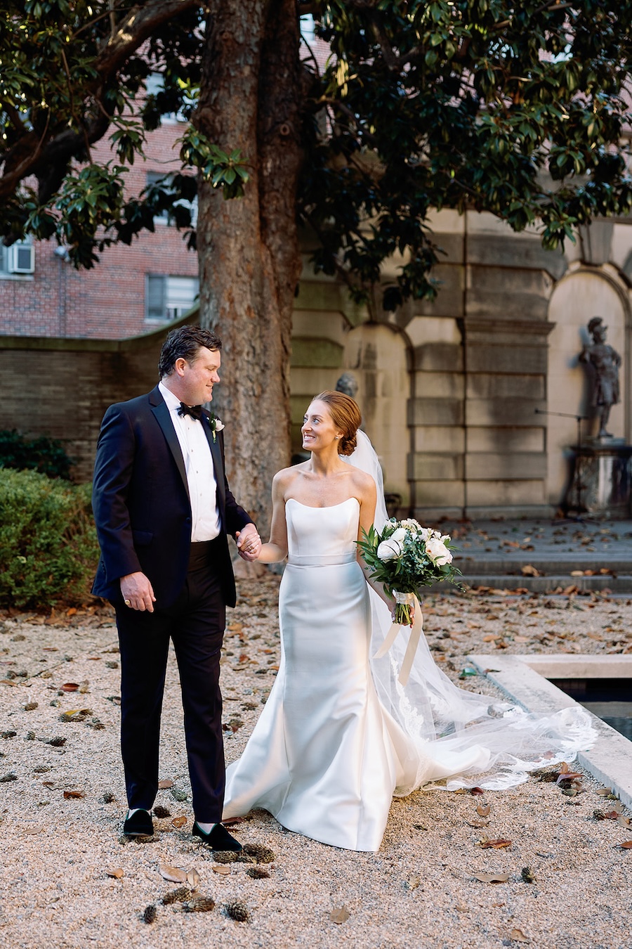 bride and groom outdoor walking portrait. Timeless winter wedding, anderson house, washington dc, sarah bradshaw photography.