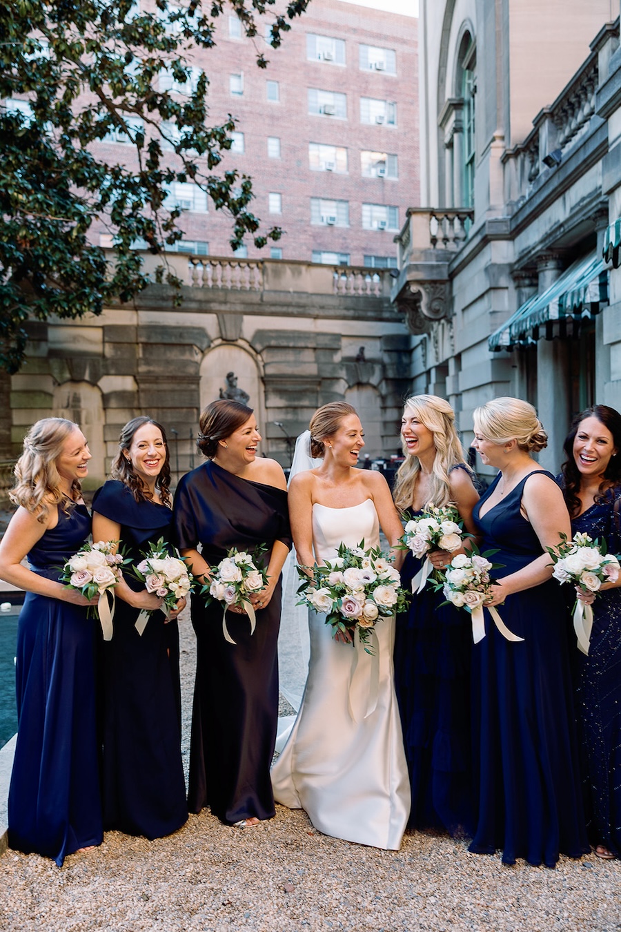 bride and bridesmaids laughing portrait. Timeless winter wedding, anderson house, washington dc, sarah bradshaw photography.