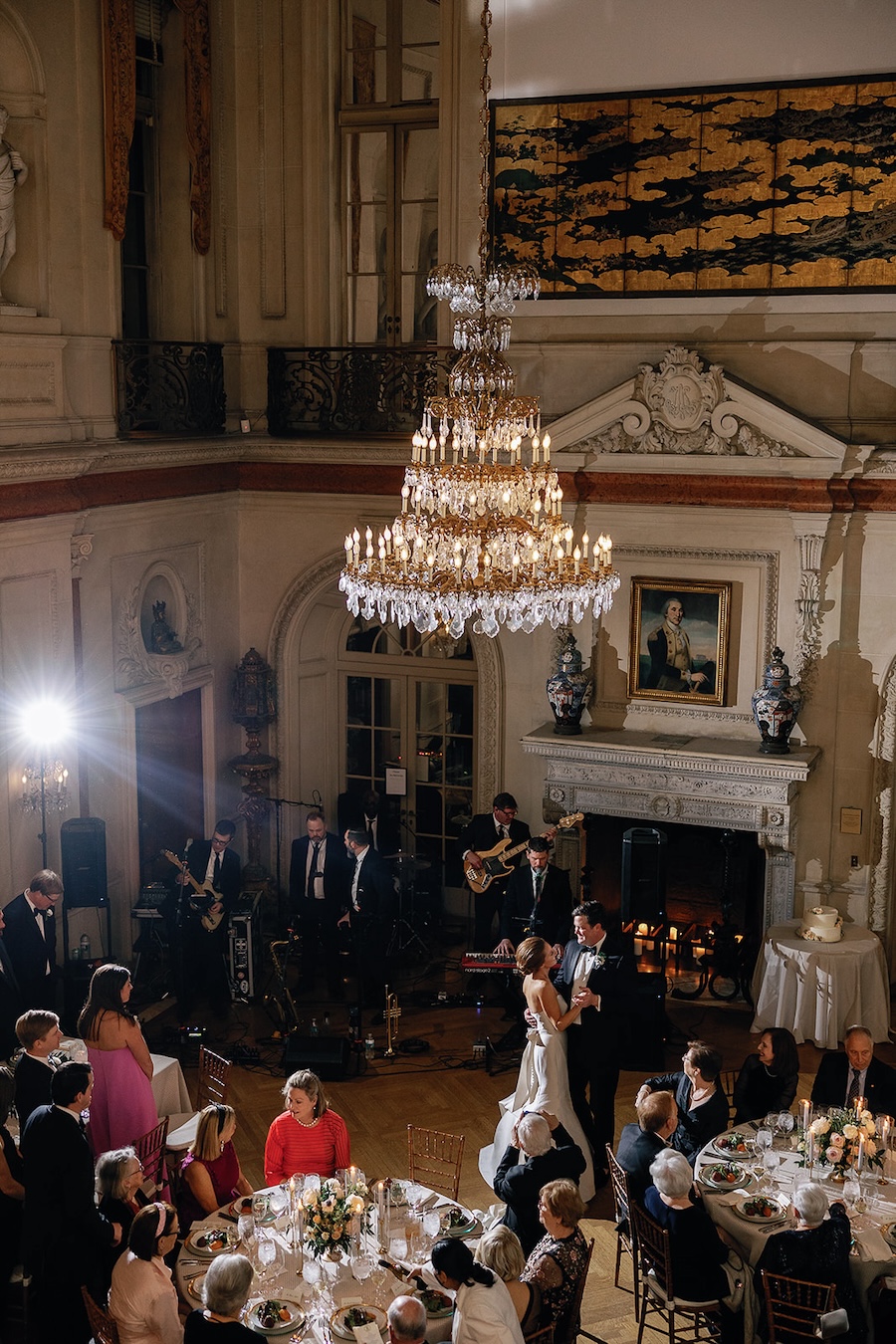 bride and groom first dance under elegant chandelier. Timeless winter wedding, anderson house, washington dc, sarah bradshaw photography.