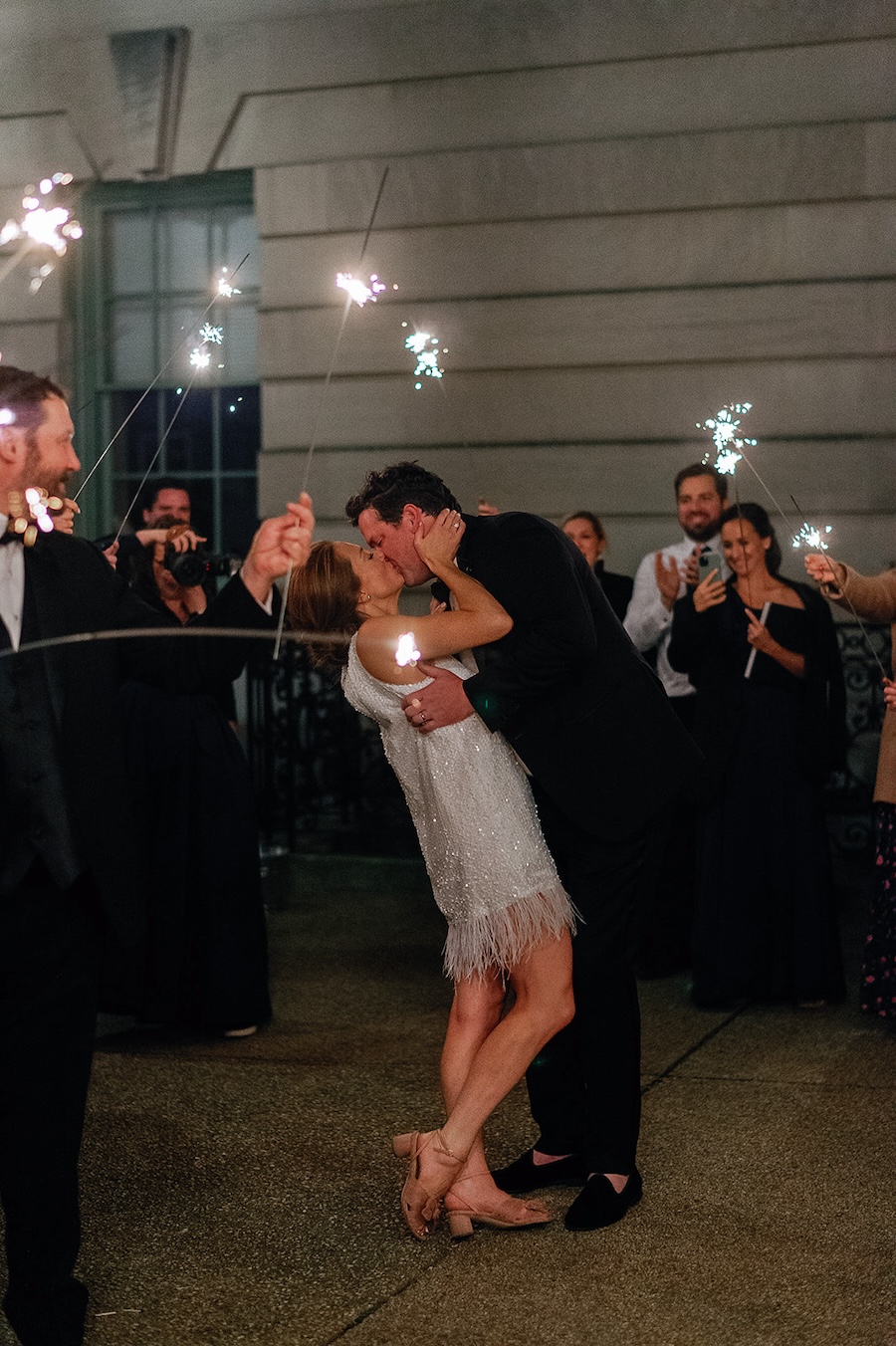 wedding sparkler exit. bride and groom kiss. Timeless winter wedding, anderson house, washington dc, sarah bradshaw photography.