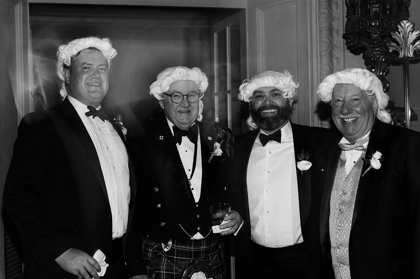 Groom and guests wear presidential inspired wigs at wedding reception. Timeless winter wedding, anderson house, washington dc, sarah bradshaw photography.