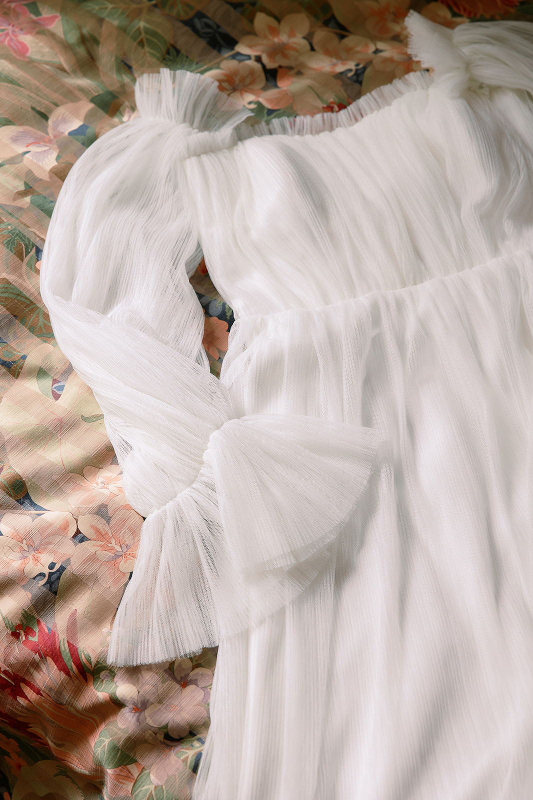 Simple tulle wedding dress with long sleeves. Custom bridal gown. spring private home tented wedding in South Carolina. Sarah Bradshaw Photography