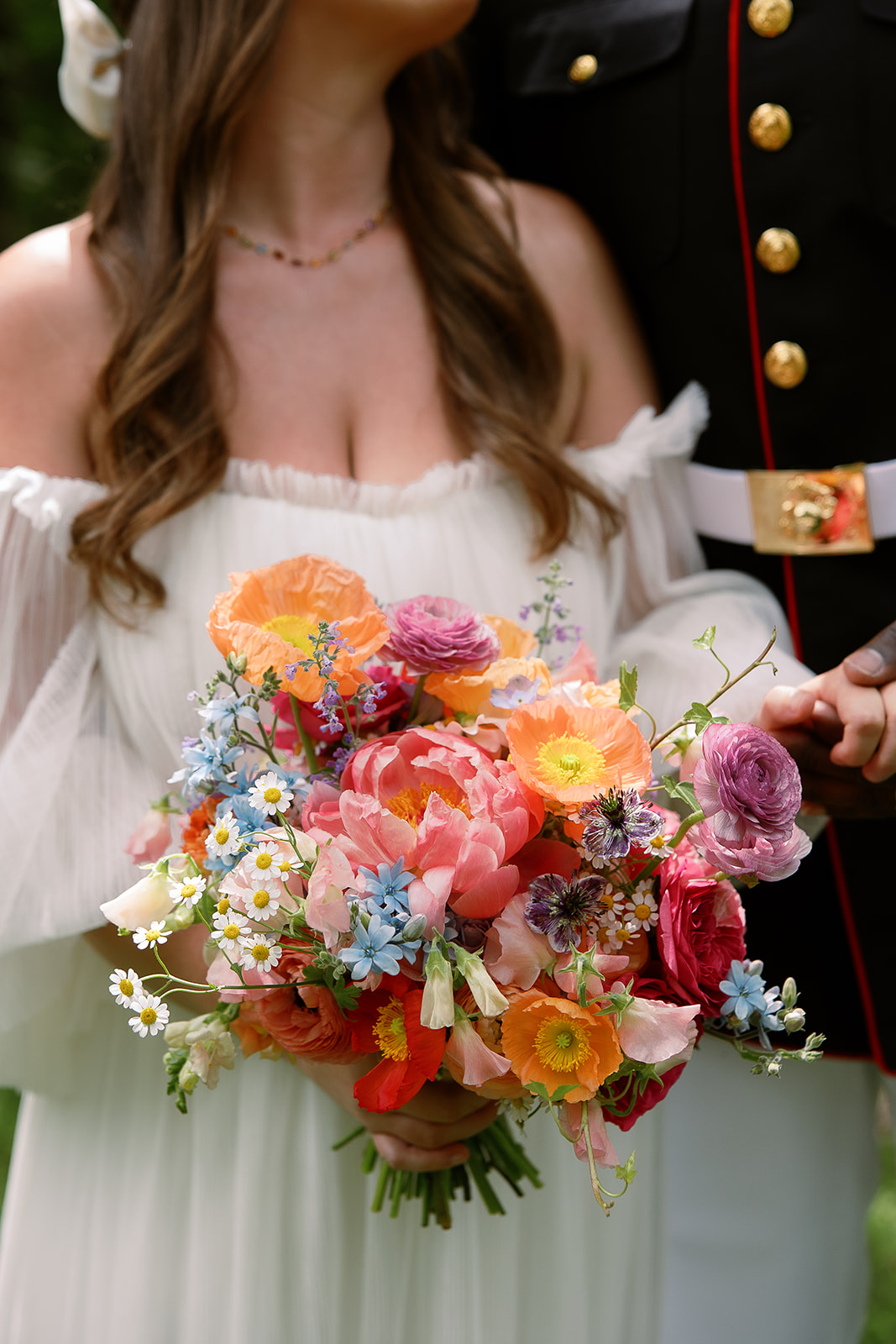 bright and colorful bridal bouquet. spring wedding in south carolina. private home, tented. Sarah Bradshaw Photography