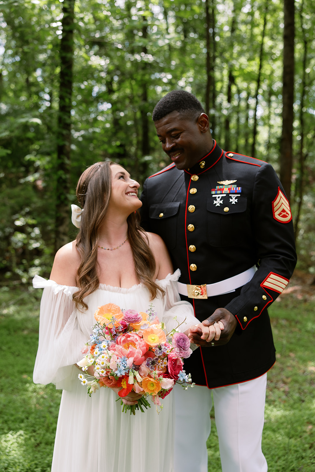 Portrait of bride looking at groom. Private at home tented wedding in south carolina. Sarah Bradshaw Photography