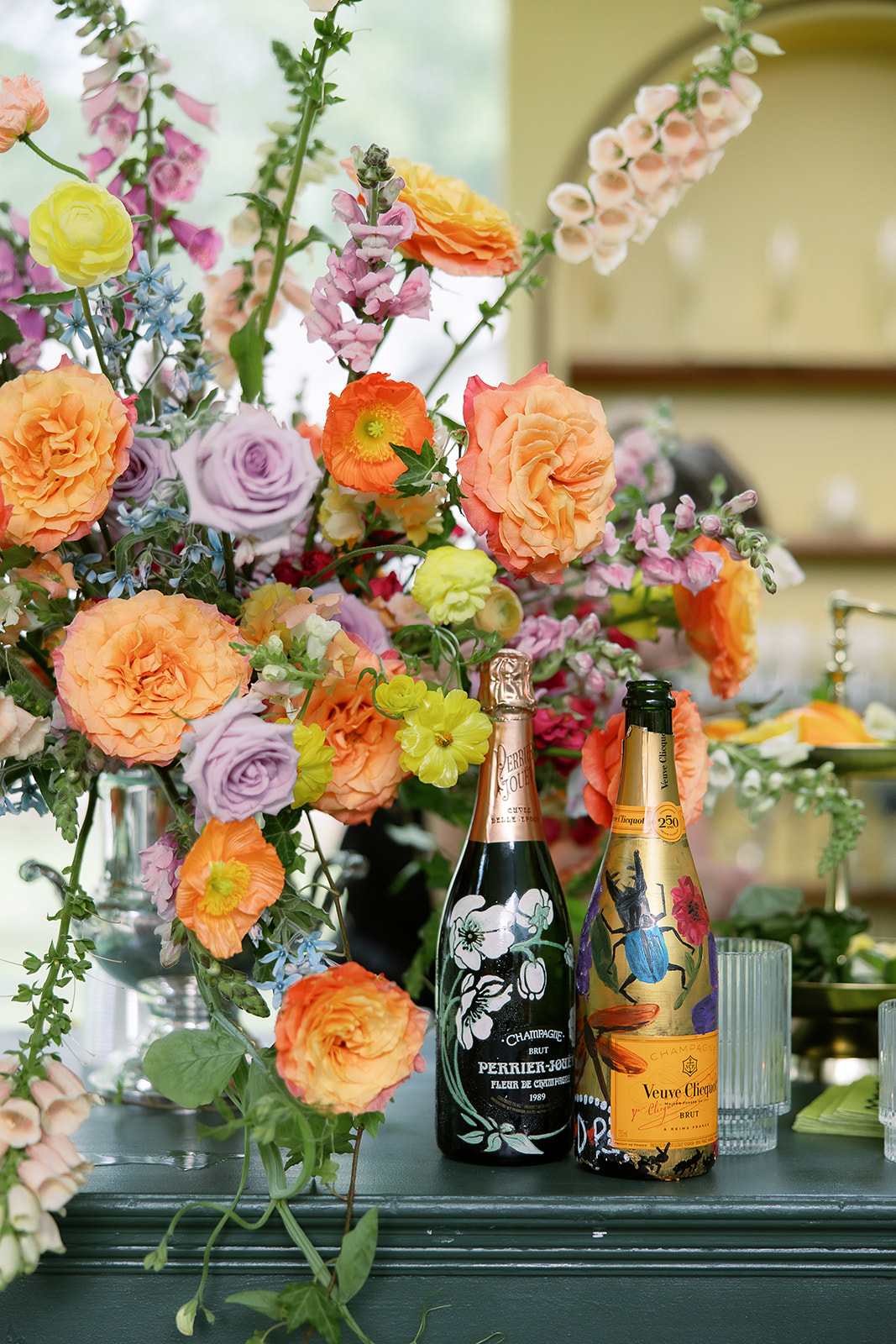 Colorful, lush floral arrangement. wedding bar decor. Spring, private home tented wedding in south carolina. Sarah Bradshaw Photography