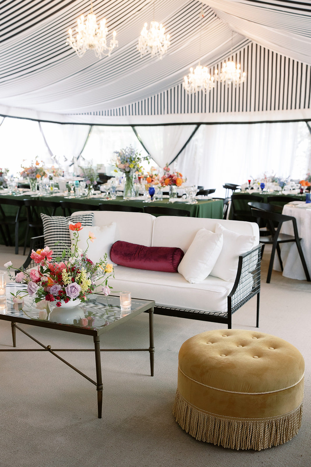 Elegant wedding lounge seating design. colorful floral arrangements. Spring, private home tented wedding in south carolina. Sarah Bradshaw Photography