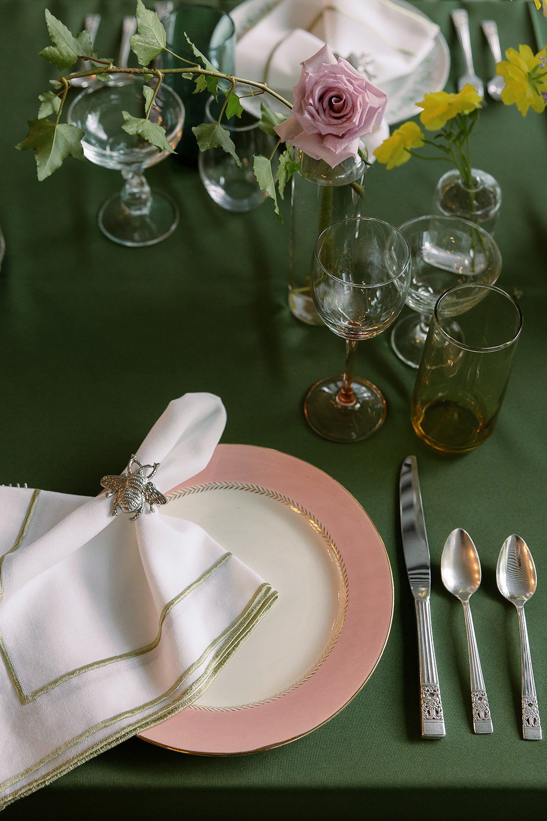 Simple wedding tablescape, bee napkin ring, bud vases. Spring, private home tented wedding in south carolina. Sarah Bradshaw Photography