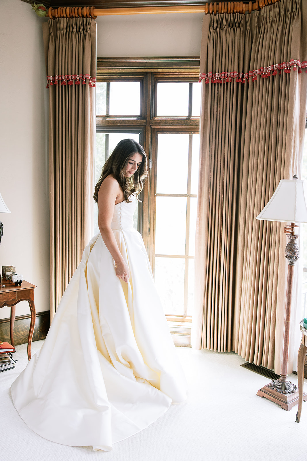 bride in classic strapless ball gown wedding dress. elegant spring wedding in south carolina. sarah bradshaw photography