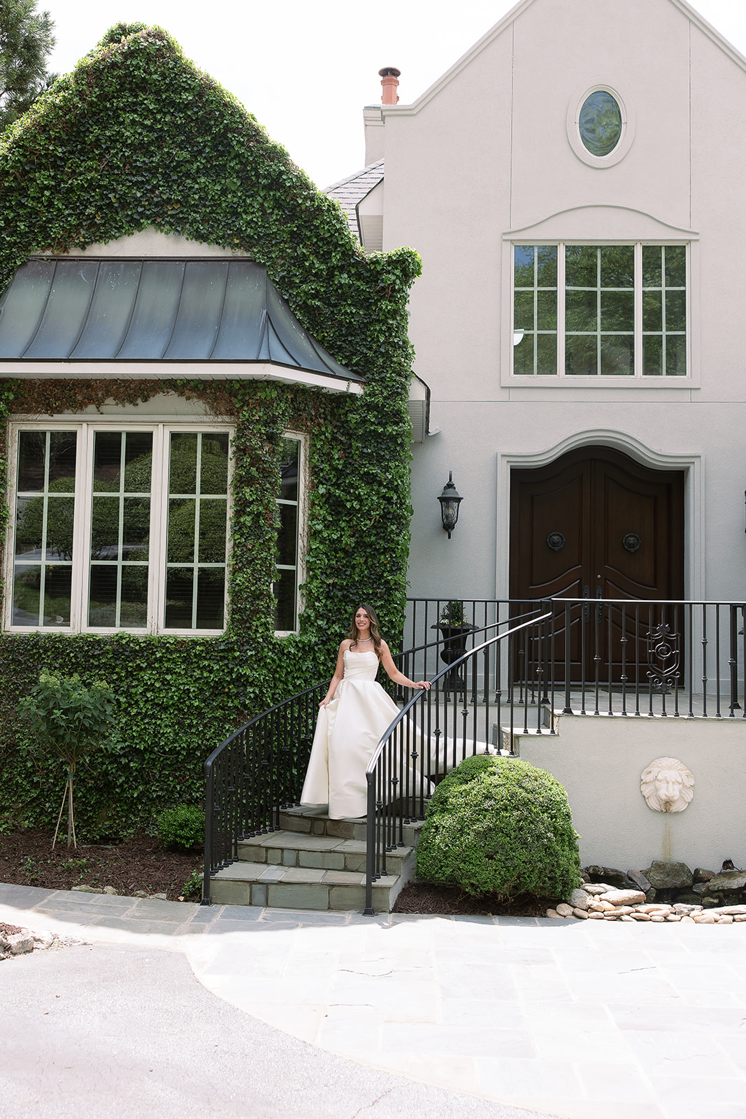 bridal portrait, bride walking down stairs in ball gown wedding dress. elegant spring wedding, south carolina. sarah bradshaw photography