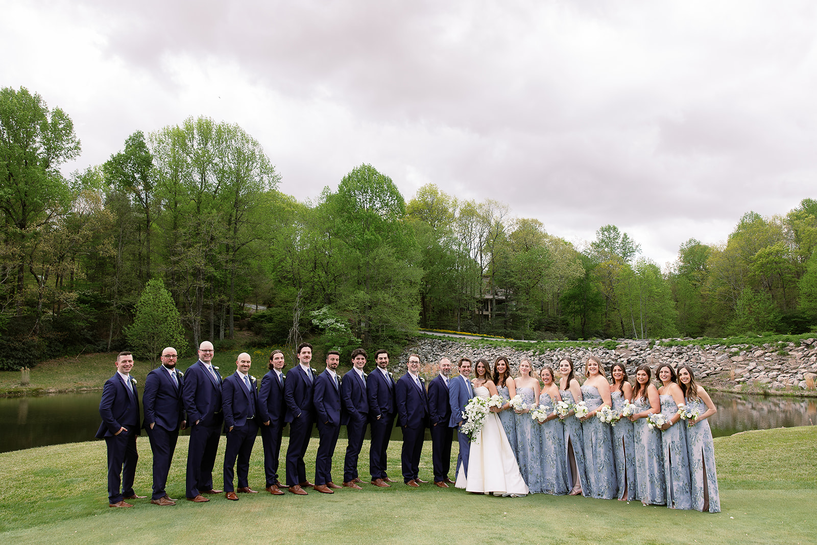 traditional wedding party portrait, posing on golf course. elegant south carolina spring wedding. sarah bradshaw photography