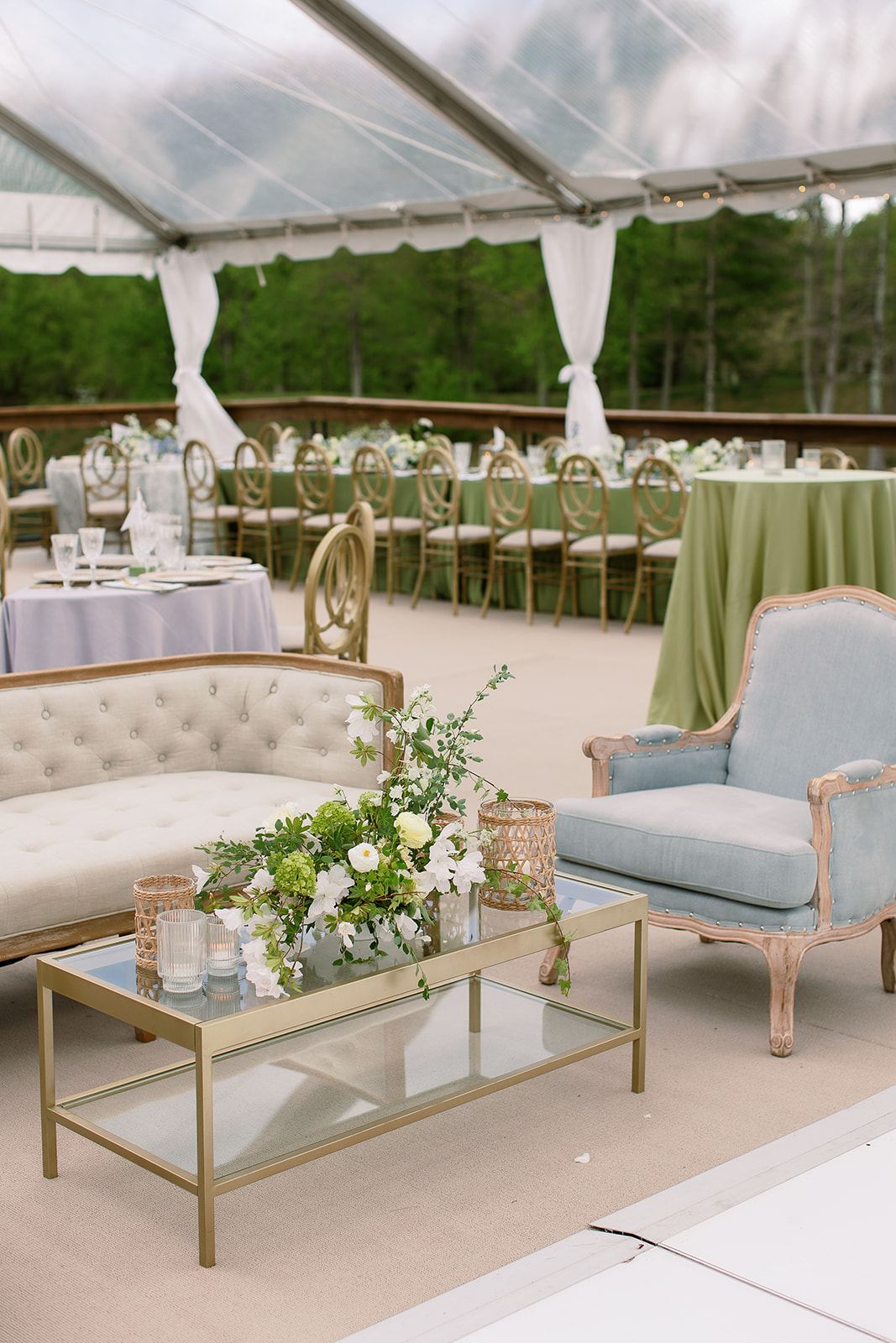 Chic wedding seating lounge, cream sofa, light blue armchair. elegant south carolina spring wedding. sarah bradshaw photography