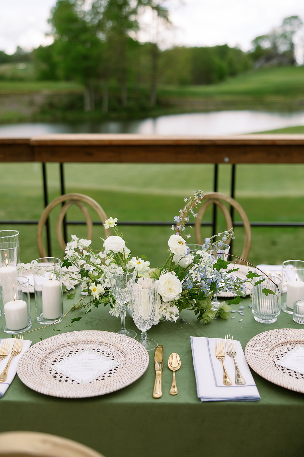 Lush, low floral centerpiece with cream accents. Reception overlooking golf course. elegant south carolina spring wedding. sarah bradshaw photography