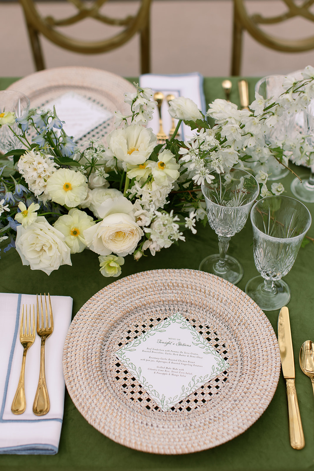 Elegant wedding reception tablescape, lush floral centerpieces, rattan chargers. elegant south carolina spring wedding. sarah bradshaw photography