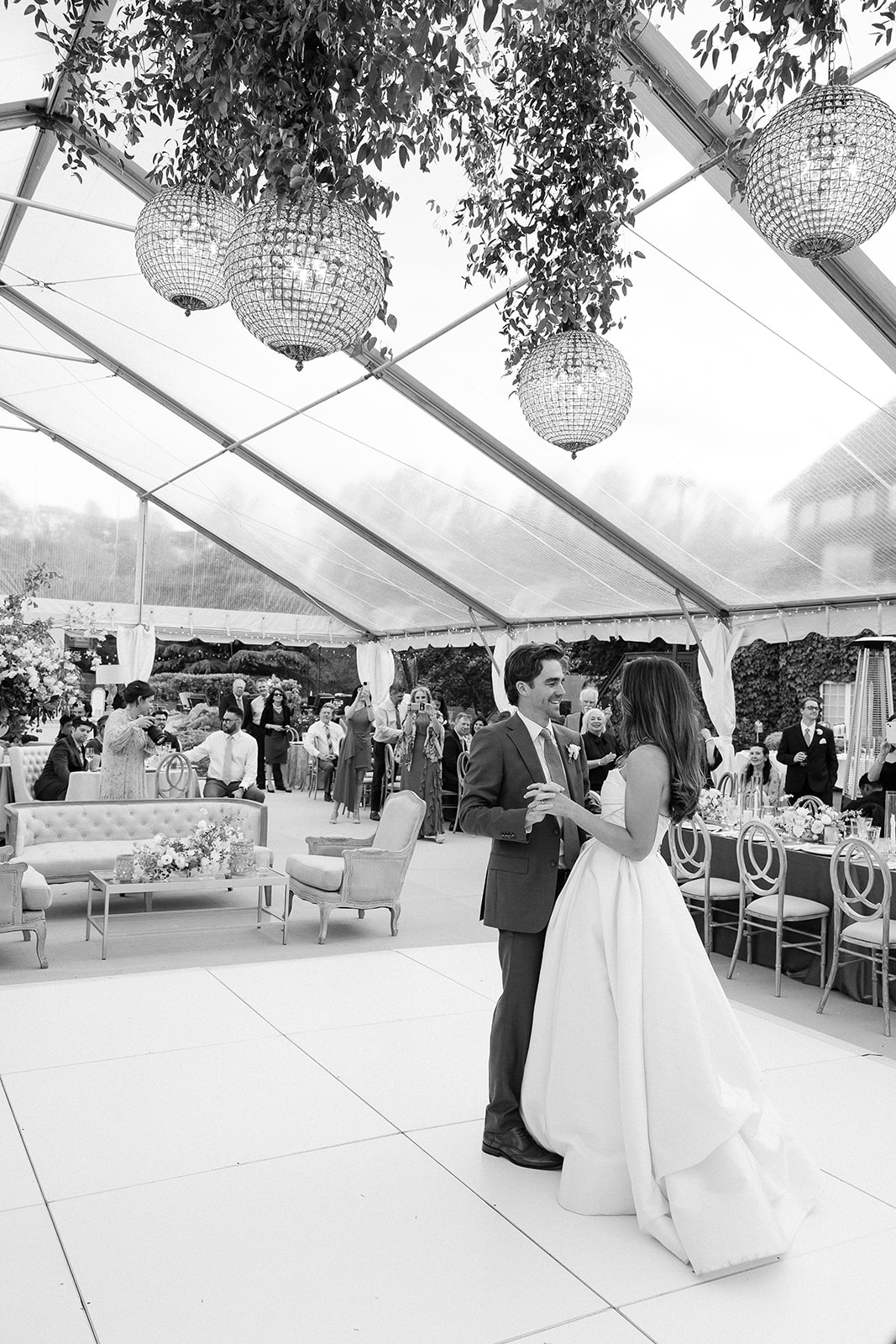 Bride and groom first dance in wedding tent. elegant south carolina spring wedding. sarah bradshaw photography