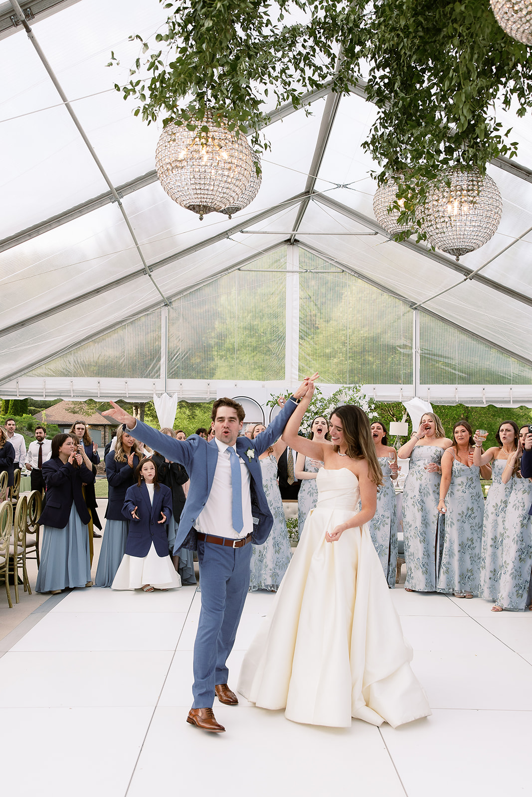 bride and groom celebrate first dance in clear wedding tent. elegant south carolina spring wedding. sarah bradshaw photography