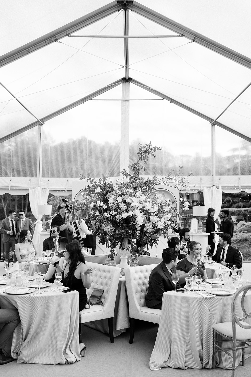 black and white portrait during cocktail hour. unique lounge seating. elegant south carolina spring wedding. sarah bradshaw photography