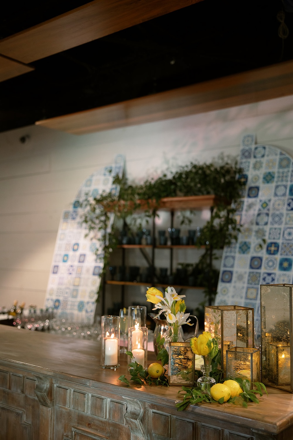 Moody bar decor, geometric terrarium candle holders, mosaic tile.  Italian inspired wedding rehearsal dinner in Greenville, SC. Sarah Bradshaw Photography