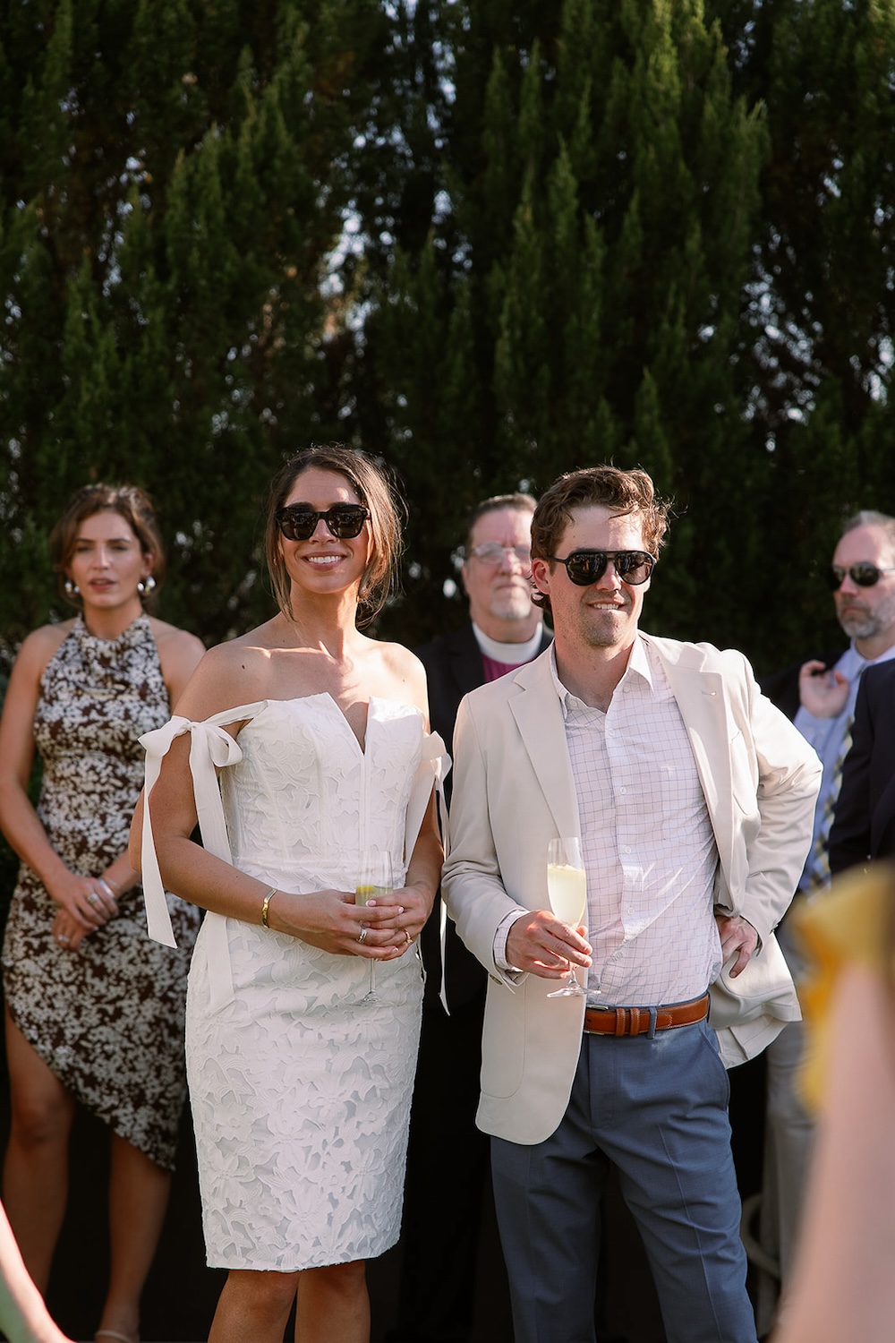 Outdoor rehearsal dinner attire for bride and groom.  Italian inspired wedding rehearsal dinner in Greenville, SC. Sarah Bradshaw Photography